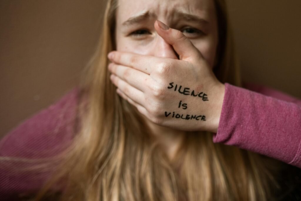 Powerful image highlighting the message 'Silence is Violence' to raise awareness on social issues.