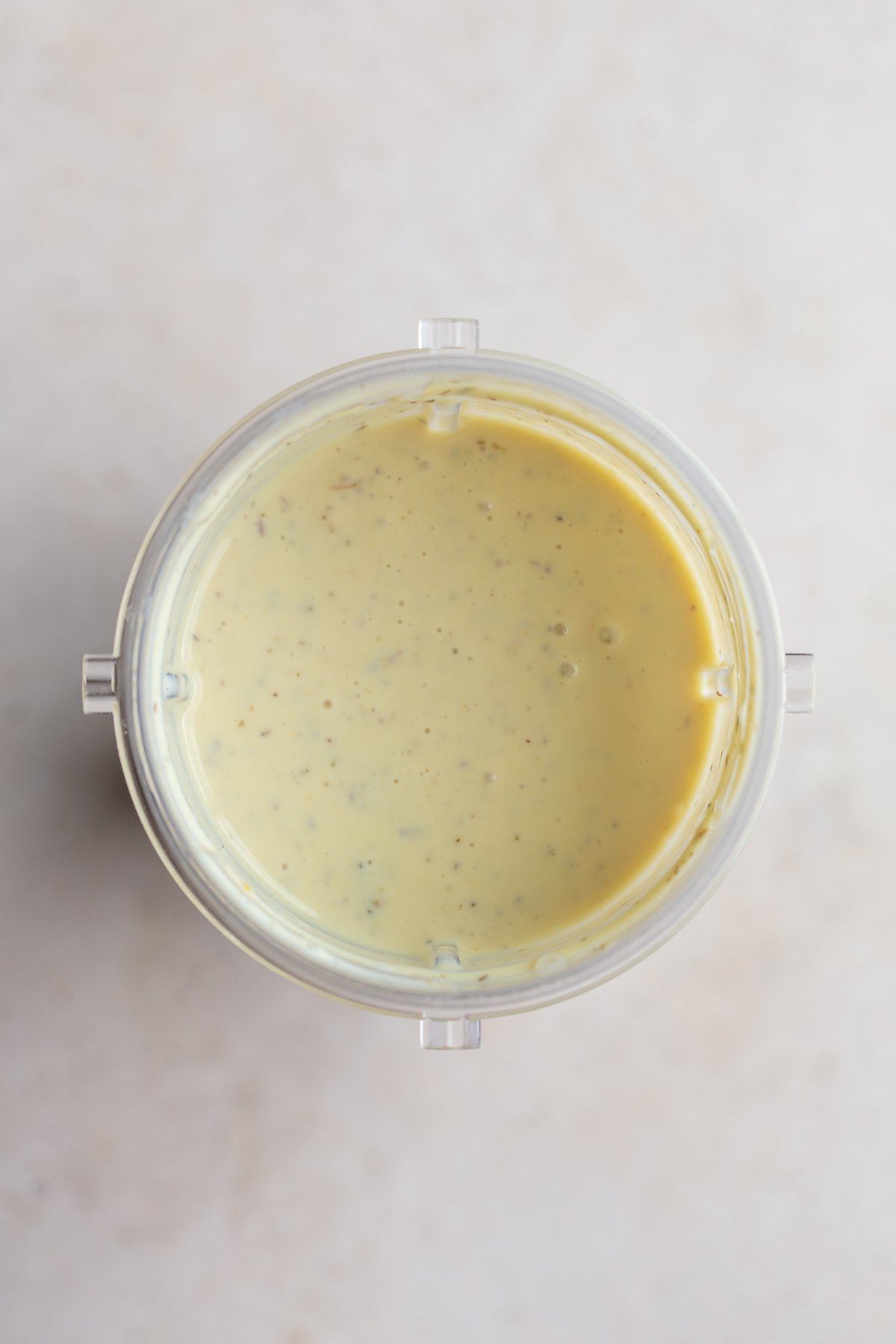 Tofu pasta sauce blended in a blender cup.